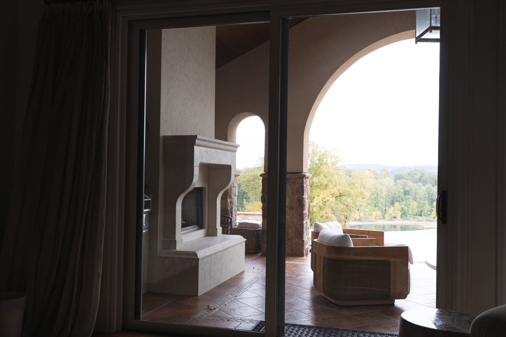Custom cast stone fireplace surround — Cranic project installation.